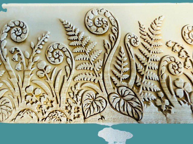 Sharon Hoppe Designs Fiddle Fern Forest wooden muggie board with intricate botanical relief carving for pottery